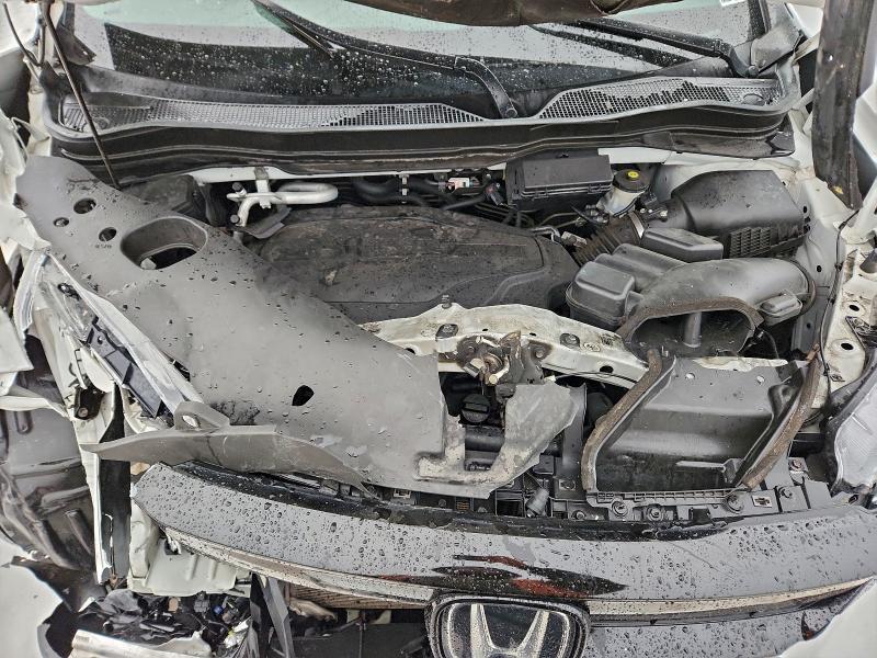 Снимка 12 от търг – 2021 HONDA PILOT SE с VIN 5FNYF6H26MB097173