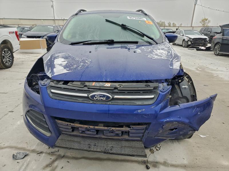 Photo 5 from auction – 2016 FORD ESCAPE SE with VIN 1FMCU0GX5GUC10239