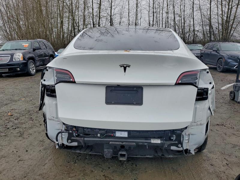Photo 6 from auction – 2023 TESLA MODEL Y with VIN 7SAYGDEE8PF697779
