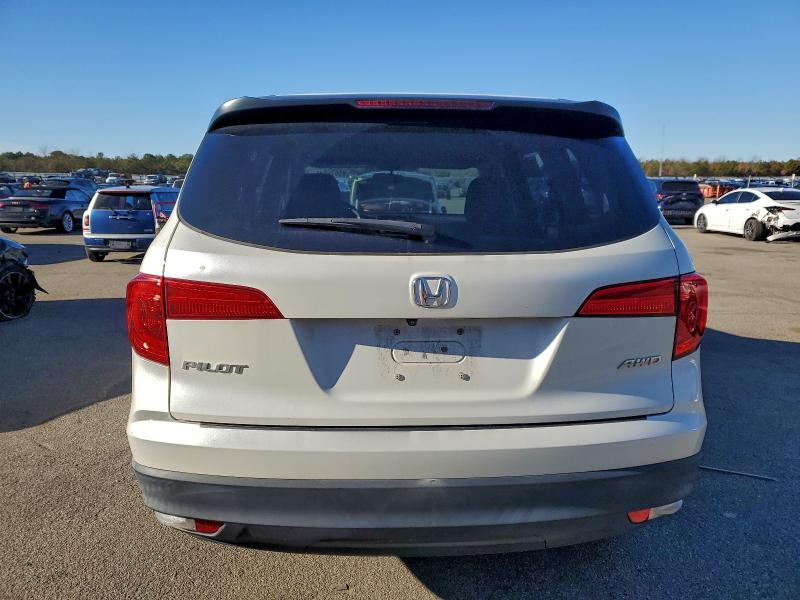 Photo 6 from auction – 2016 HONDA PILOT LX with VIN 5FNYF6H16GB058451