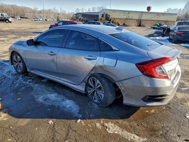 Photo 2 from auction – 2016 HONDA CIVIC with VIN 2HGFC1F73GH652386