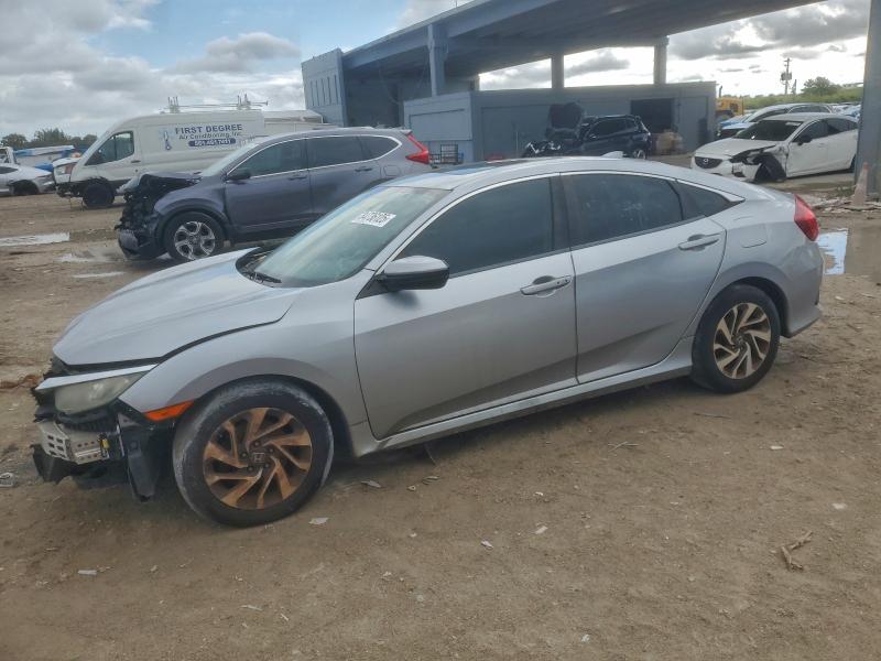 HONDA CIVIC 2018 with VIN 19XFC2F76JE018044 - Photo from auction