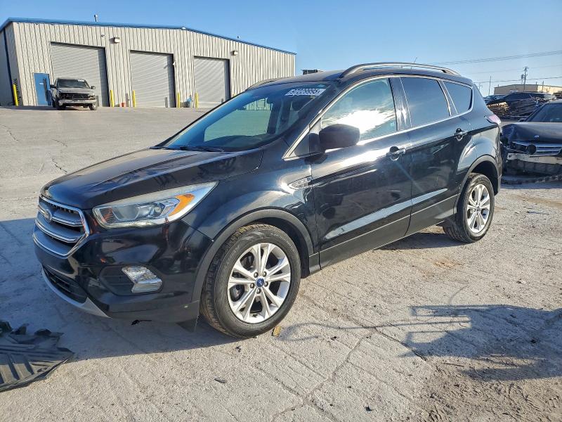 FORD ESCAPE SE 2017 with VIN 1FMCU0GD8HUE53115 - Photo from auction