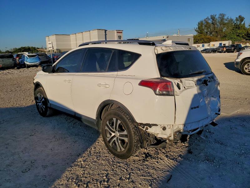 Photo 2 from auction – 2016 TOYOTA RAV4 LE with VIN JTMZFREV7GJ066080