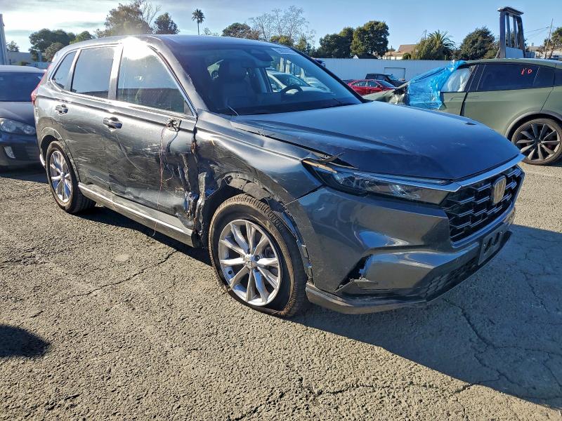 Photo 4 from auction – 2023 HONDA CR-V EX with VIN 7FARS3H43PE004229