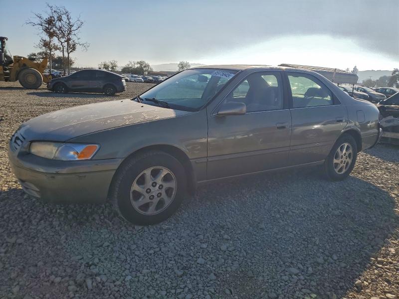 TOYOTA CAMRY LE 1999 with VIN JT2BF22K2X0153273 - Photo from auction