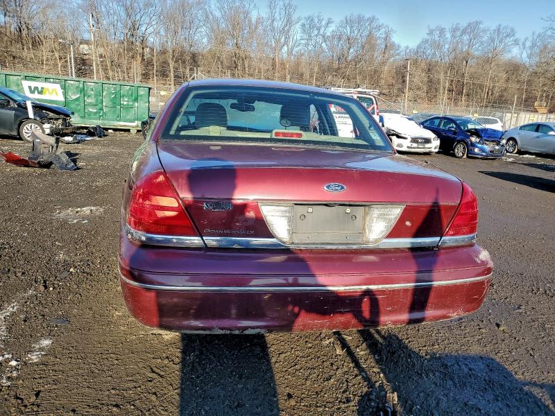 Photo 6 from auction – 2004 FORD CROWN VICT with VIN 2FAFP74W04X124084