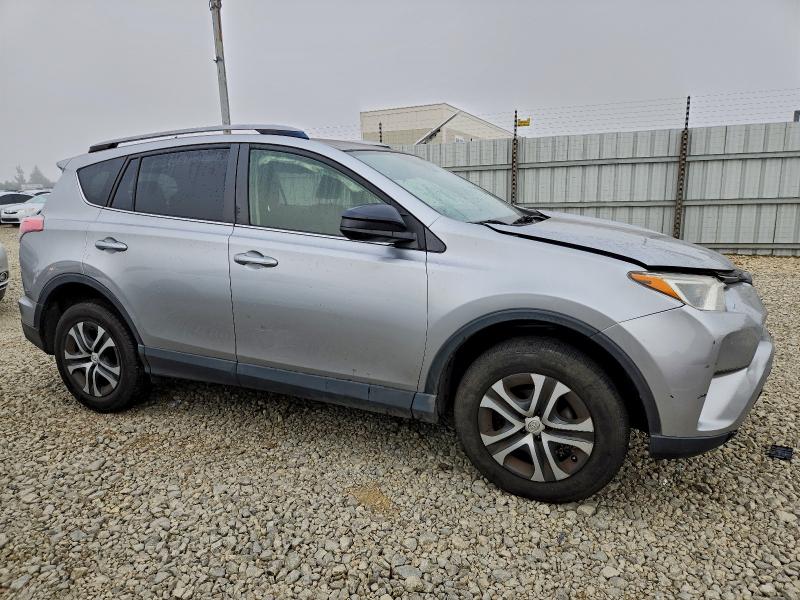 Photo 4 from auction – 2018 TOYOTA RAV4 with VIN JTMZFREV7JJ180104