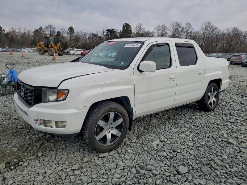 HONDA RIDGELINE 2014 con VIN 5FPYK1F61EB009899 - Foto de la subasta
