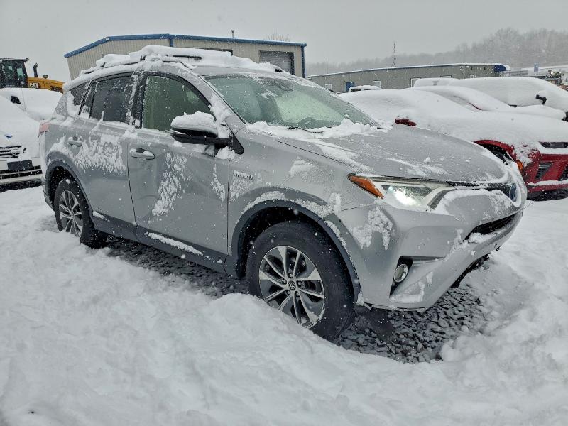 Photo 4 from auction – 2017 TOYOTA RAV4 HV LE with VIN JTMRJREV4HD073082