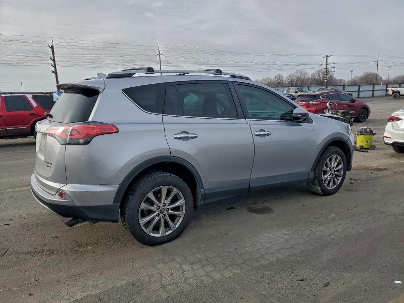Photo 3 from auction – 2018 TOYOTA RAV4 LIMIT with VIN 2T3DFREV6JW700868