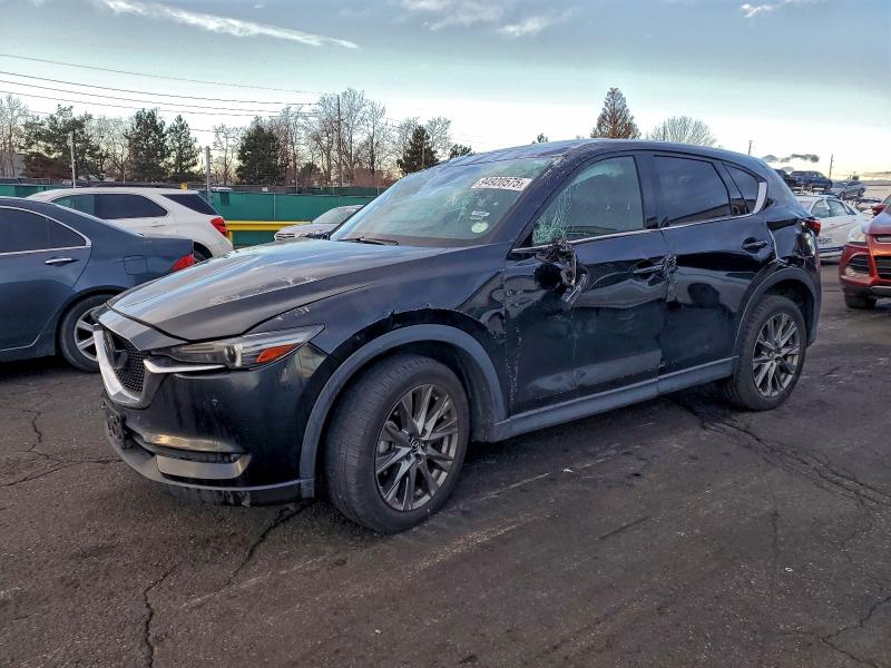 Photo 1 from auction – 2021 MAZDA CX-5 SIGNA with VIN JM3KFBEY1M0325934