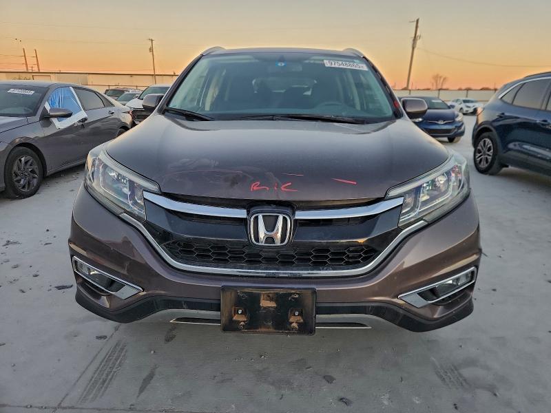 Photo 5 from auction – 2016 HONDA CR-V EXL with VIN 2HKRM3H79GH506874