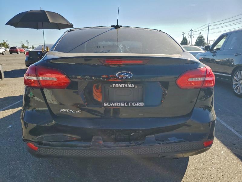 Photo 6 from auction – 2018 FORD FOCUS S with VIN 1FADP3E29JL304054
