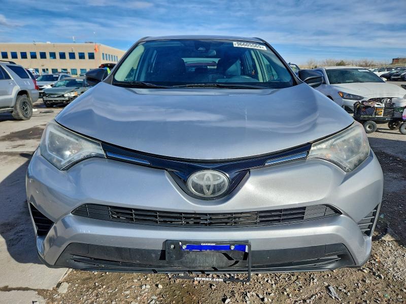 Photo 5 from auction – 2018 TOYOTA RAV4 LE with VIN 2T3BFREV1JW734448
