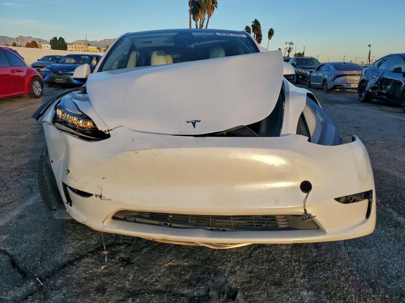 Photo 5 from auction – 2021 TESLA MODEL Y with VIN 5YJYGAEE4MF157451