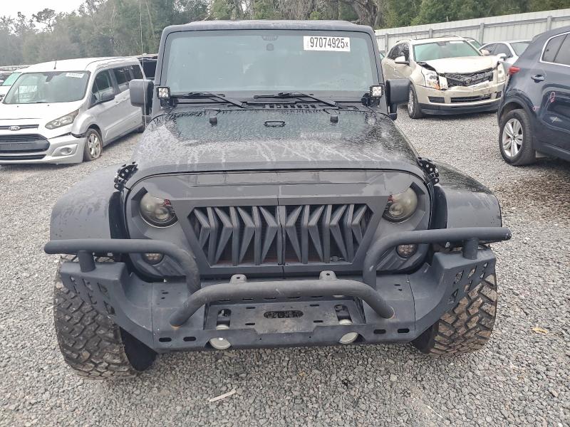 Photo 5 from auction – 2012 JEEP WRANGLER U with VIN 1C4BJWEG5CL236709