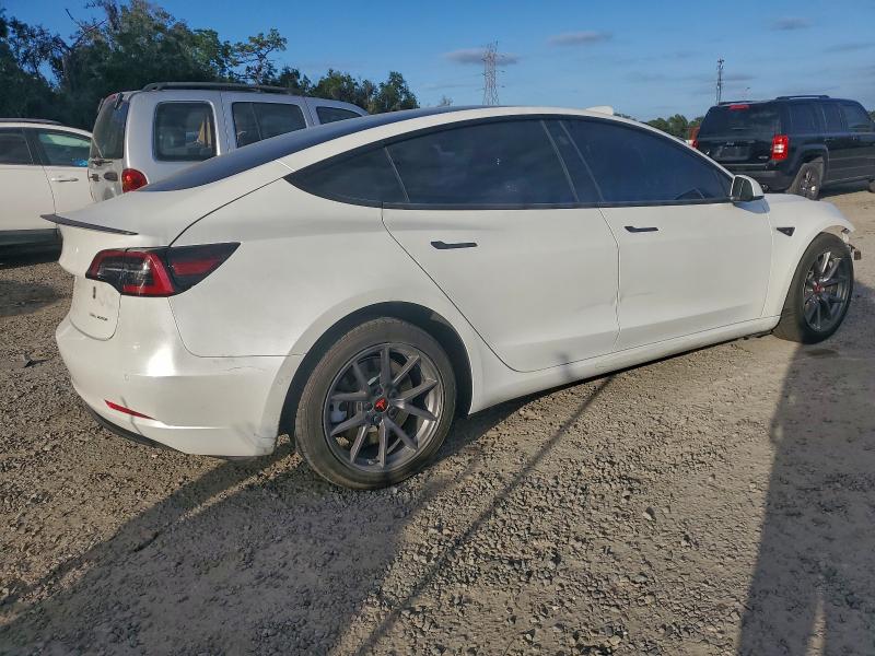 Photo 3 from auction – 2022 TESLA MODEL 3 with VIN 5YJ3E1EB8NF105098