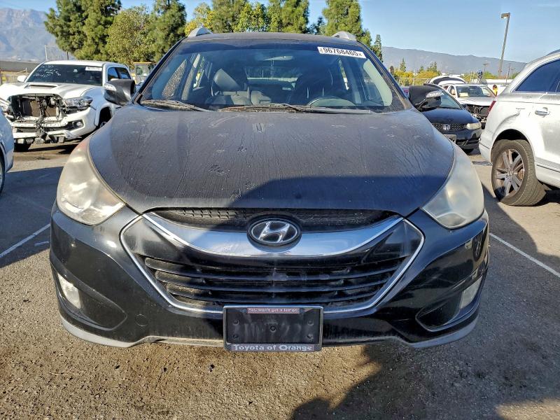 Photo 5 from auction – 2011 HYUNDAI TUCSON with VIN KM8JU3AC1BU130606