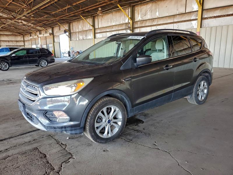 Photo 1 from auction – 2018 FORD ESCAPE SE with VIN 1FMCU0G95JUC63600