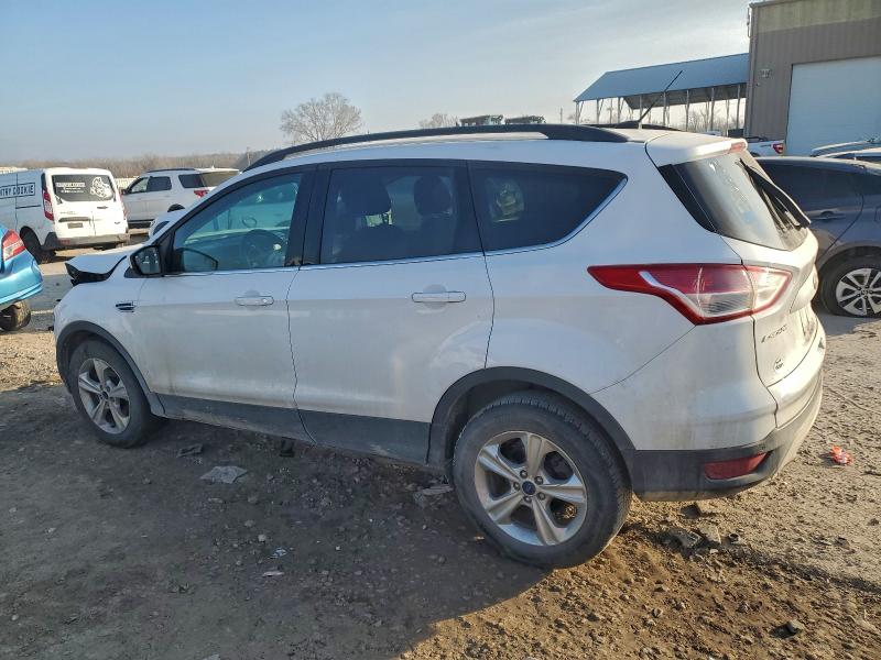 Photo 2 from auction – 2014 FORD ESCAPE SE with VIN 1FMCU9GX6EUE18583