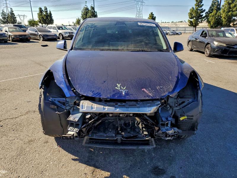 Photo 5 from auction – 2023 TESLA MODEL Y with VIN 7SAYGDEE0PA078137