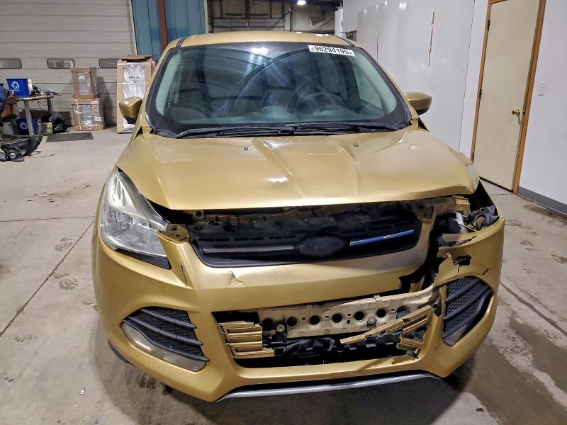 Photo 5 from auction – 2015 FORD ESCAPE with VIN 1FMCU9G95FUA11552