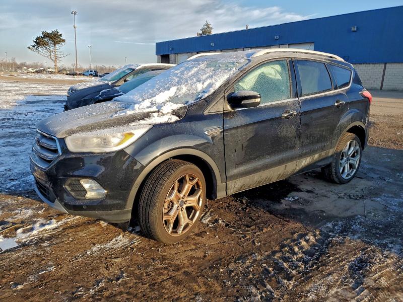 FORD ESCAPE TIT 2019 with VIN 1FMCU9J92KUA26058 - Photo from auction