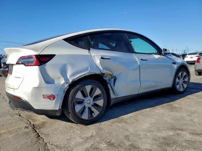 Photo 3 from auction – 2023 TESLA MODEL Y with VIN 7SAYGAEE9PF757700