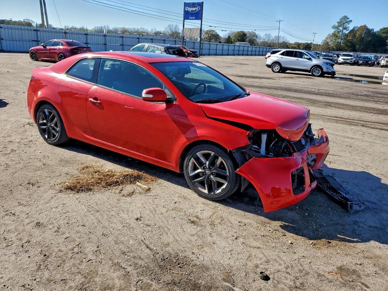 Photo 4 from auction – 2010 KIA FORTE with VIN KNAFW6A31A5259019