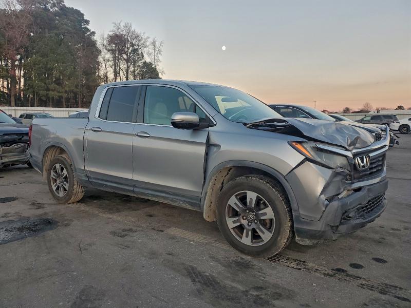 Photo 4 from auction – 2017 HONDA RIDGELINE with VIN 5FPYK3F54HB014697