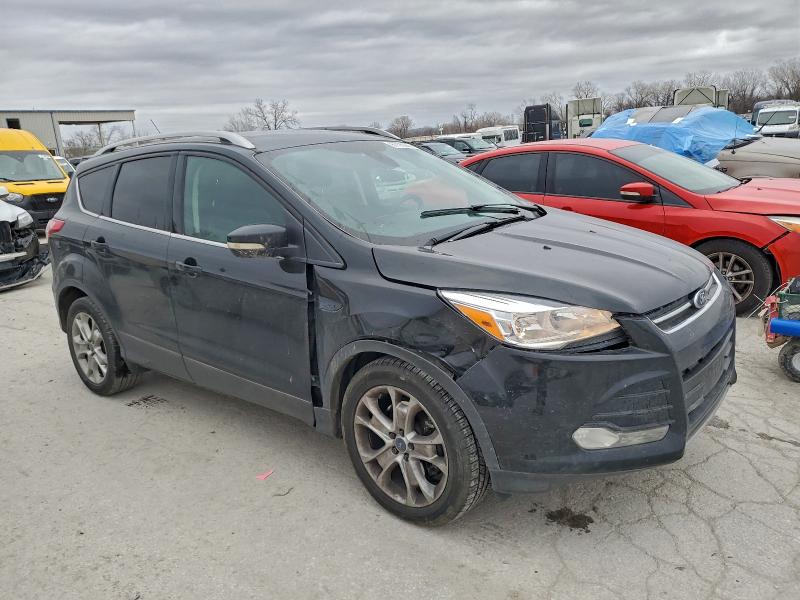 Photo 4 from auction – 2014 FORD ESCAPE TIT with VIN 1FMCU9J90EUD10647