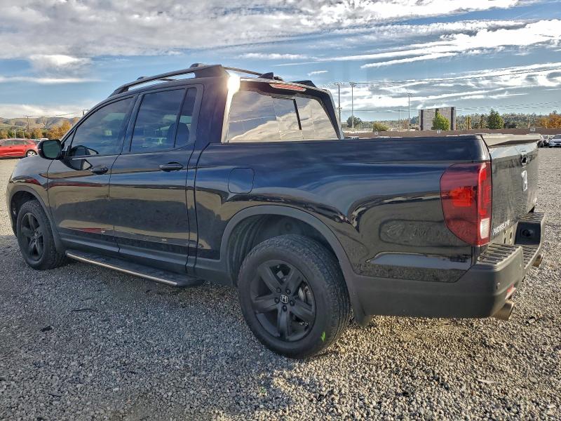 Photo 2 from auction – 2023 HONDA RIDGELINE with VIN 5FPYK3F83PB058649