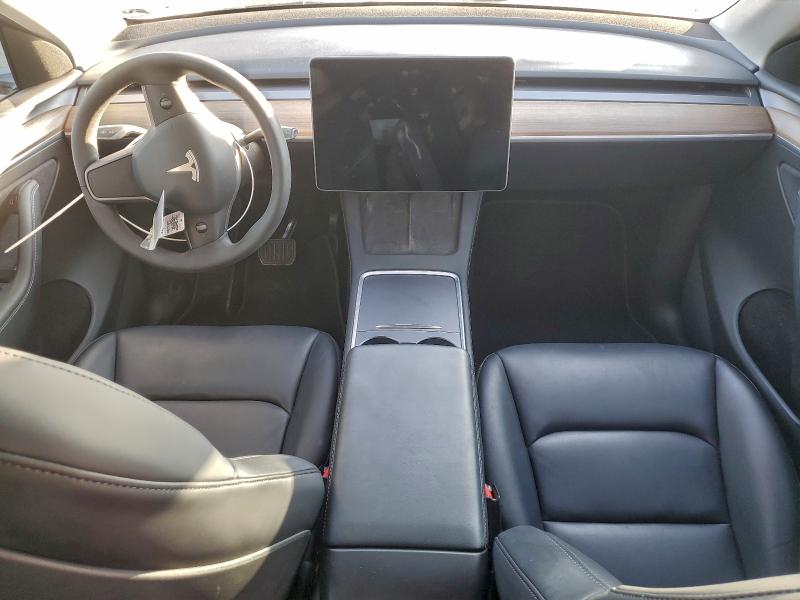 Photo 8 from auction – 2022 TESLA MODEL Y with VIN 7SAYGAEE2NF574135