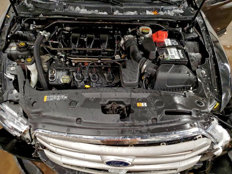 Photo 11 from auction – 2015 FORD TAURUS SEL with VIN 1FAHP2E8XFG188380