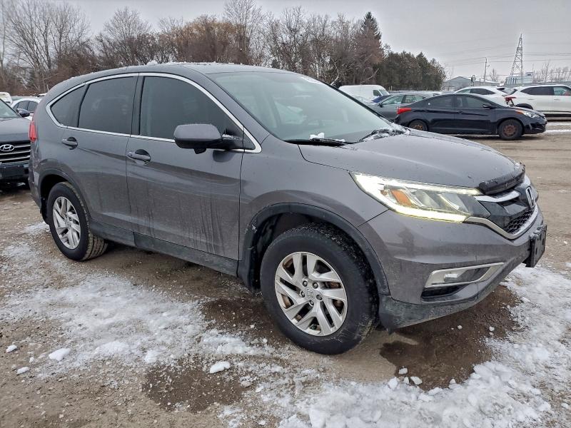 Photo 4 from auction – 2015 HONDA CR-V EX with VIN 2HKRM4H50FH102476