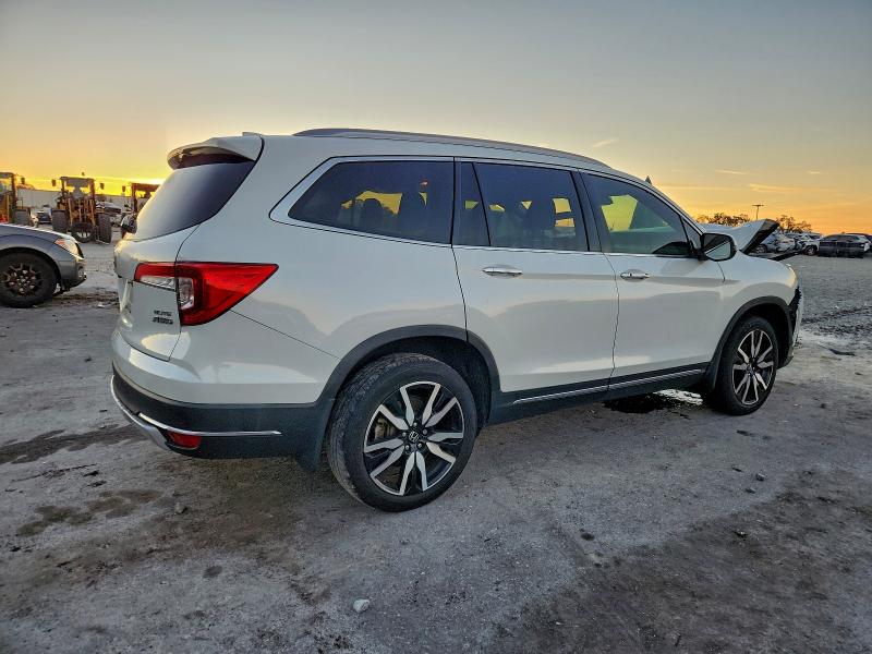 Photo 3 from auction – 2022 HONDA PILOT ELIT with VIN 5FNYF6H01NB030609