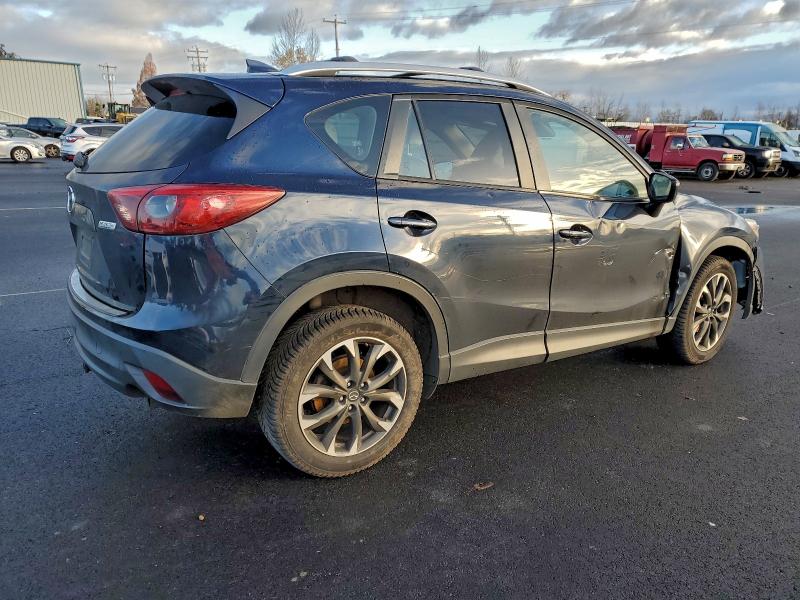Photo 3 from auction – 2016 MAZDA CX-5 GT with VIN JM3KE2DYXG0627621