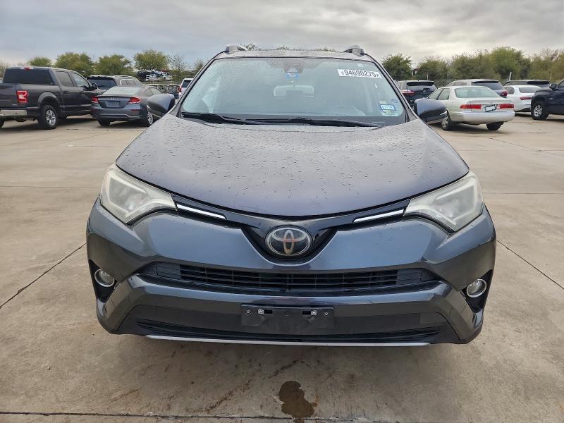 Photo 5 from auction – 2018 TOYOTA RAV4 with VIN JTMWFREV9JJ732057