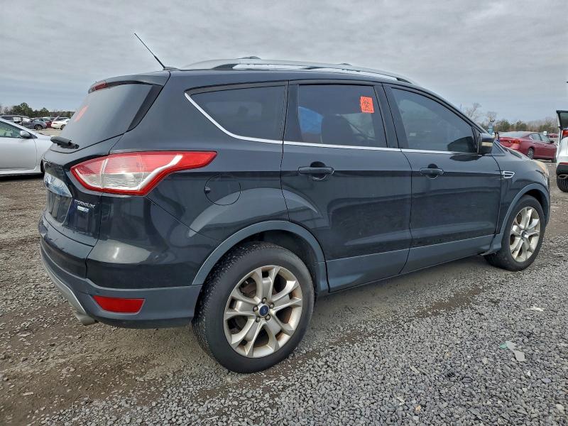 Photo 3 from auction – 2015 FORD ESCAPE with VIN 1FMCU9J94FUC62619