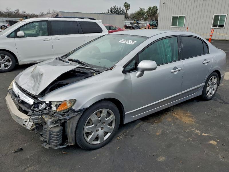 HONDA CIVIC LX 2011 with VIN 2HGFA1F51BH521955 - Photo from auction
