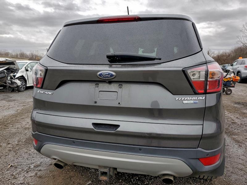 Photo 6 from auction – 2017 FORD ESCAPE TIT with VIN 1FMCU9J90HUC70784