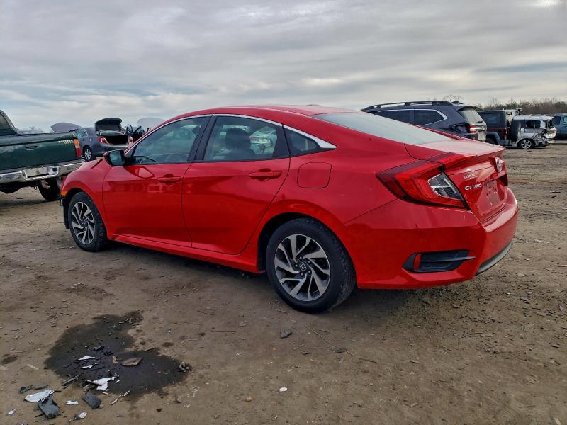 Photo 2 from auction – 2016 HONDA CIVIC EX with VIN 2HGFC2F76GH536699
