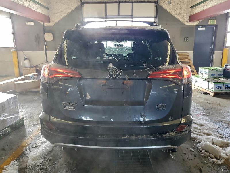 Photo 6 from auction – 2016 TOYOTA RAV4 XLE with VIN JTMRFREV4GD195912