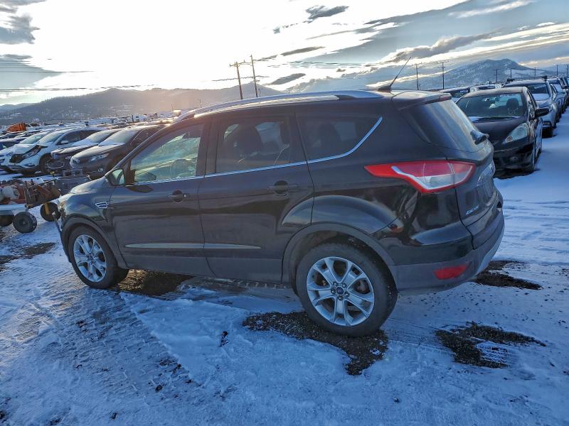 Foto 2 de la subasta – 2016 FORD ESCAPE TIT con VIN 1FMCU9J96GUA76484