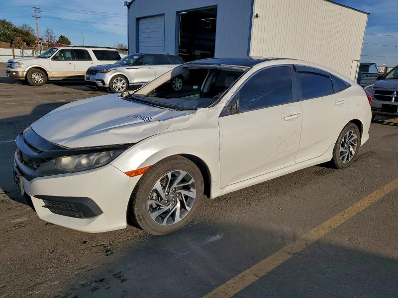 HONDA CIVIC EX 2016 with VIN 19XFC2F72GE236443 - Photo from auction