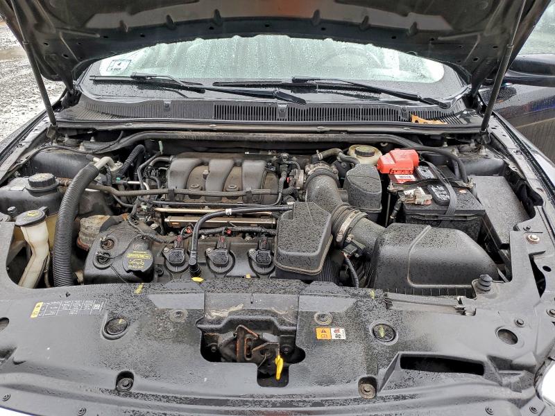 Photo 11 from auction – 2014 FORD TAURUS SEL with VIN 1FAHP2E83EG106729