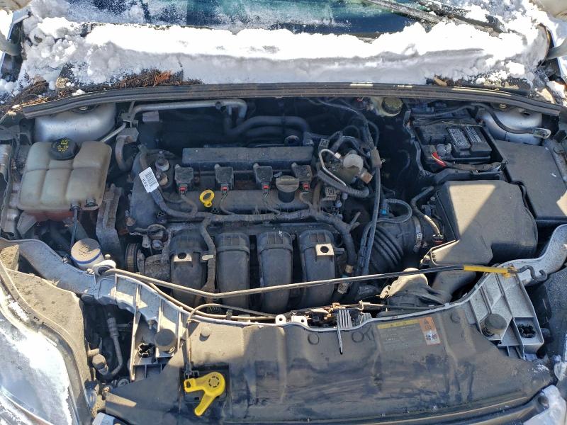 Photo 11 from auction – 2014 FORD FOCUS S with VIN 1FADP3E27EL114341