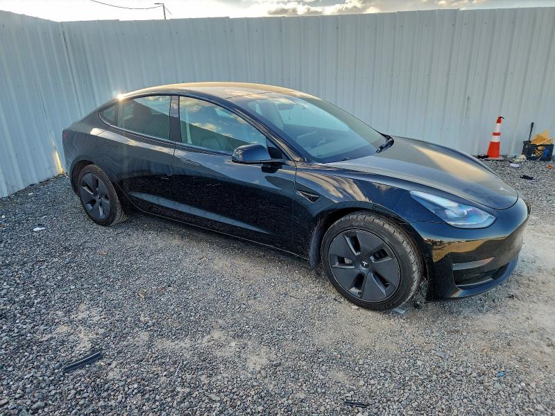 Photo 4 from auction – 2022 TESLA MODEL 3 with VIN 5YJ3E1EA9NF188256