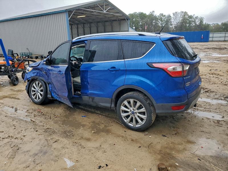 Photo 2 from auction – 2017 FORD ESCAPE TIT with VIN 1FMCU0JD1HUC22033